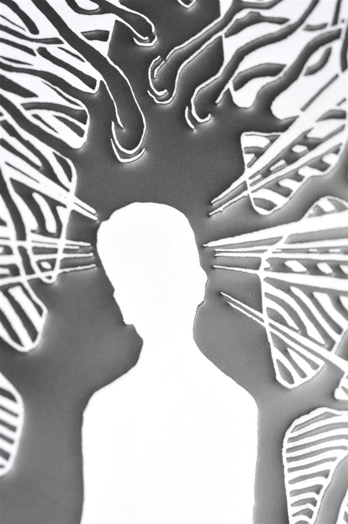 Close-up of the jacket illustration showing the silhouetted figure at the base of the tree.